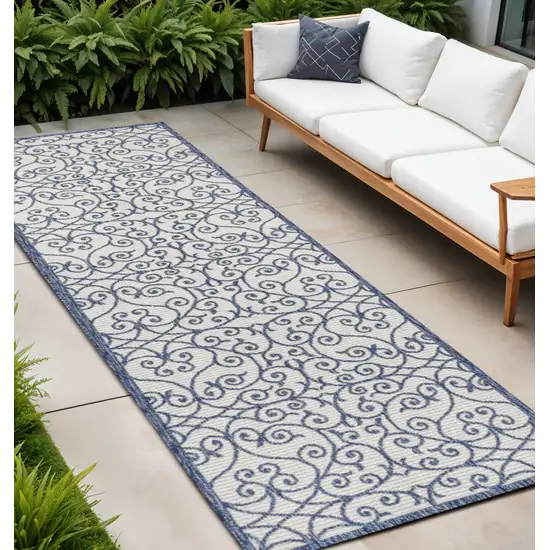 8' Blue And Cream Geometric Indoor Outdoor Runner Rug Photo 1