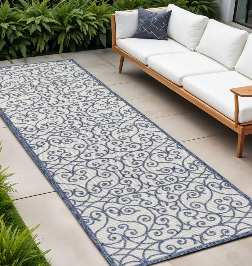 8' Blue And Cream Geometric Indoor Outdoor Runner Rug Photo 1