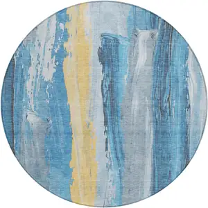 Photo of 8' Blue And Gold Round Abstract Washable Indoor Outdoor Area Rug