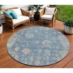 Photo of 8' Blue And Gold Round Floral Washable Indoor Outdoor Area Rug