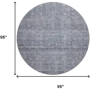 Photo of 8' Blue And Gray Geometric Washable Round Rug With UV Protection