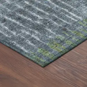 Photo of 8' Blue And Green Round Abstract Washable Indoor Outdoor Area Rug