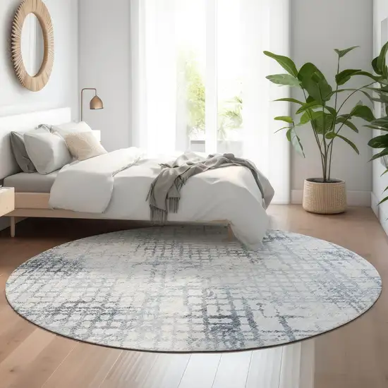 8' Blue And Ivory Abstract Geometric Washable Round Rug With UV Protection Photo 5