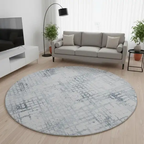 8' Blue And Ivory Abstract Geometric Washable Round Rug With UV Protection Photo 2