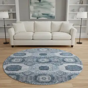 Photo of 8' Blue And Ivory Abstract Geometric Washable Round Rug With UV Protection