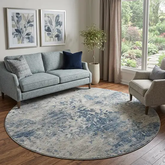 8' Blue And Ivory Abstract Washable Round Rug With UV Protection Photo 1