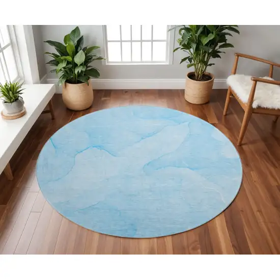 8' Blue And Ivory Abstract Washable Round Rug With UV Protection Photo 2