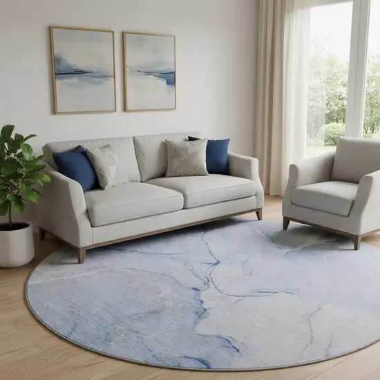 8' Blue And Ivory Abstract Washable Round Rug With UV Protection Photo 1