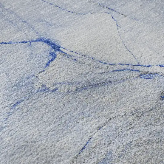 8' Blue And Ivory Abstract Washable Round Rug With UV Protection Photo 9