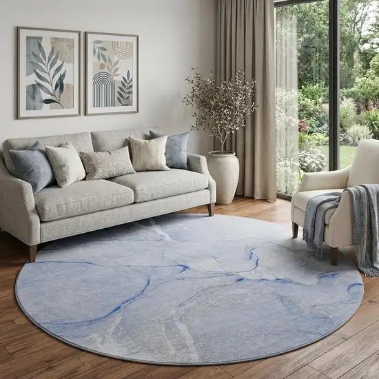 8' Blue And Ivory Abstract Washable Round Rug With UV Protection Photo 1