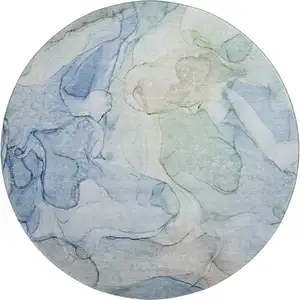 Photo of 8' Blue And Ivory Abstract Washable Round Rug With UV Protection