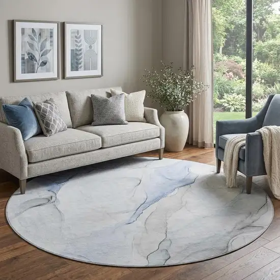 8' Blue And Ivory Abstract Washable Round Rug With UV Protection Photo 1
