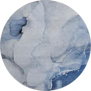 Photo of 8' Blue And Ivory Abstract Washable Round Rug With UV Protection