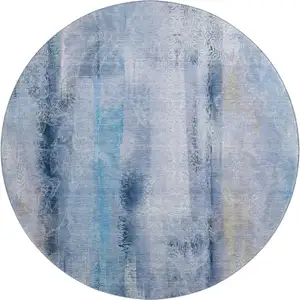 Photo of 8' Blue And Ivory Abstract Washable Round Rug With UV Protection