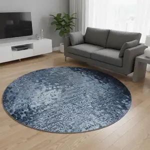 Photo of 8' Blue And Ivory Abstract Washable Round Rug With UV Protection