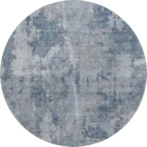 Photo of 8' Blue And Ivory Abstract Washable Round Rug With UV Protection