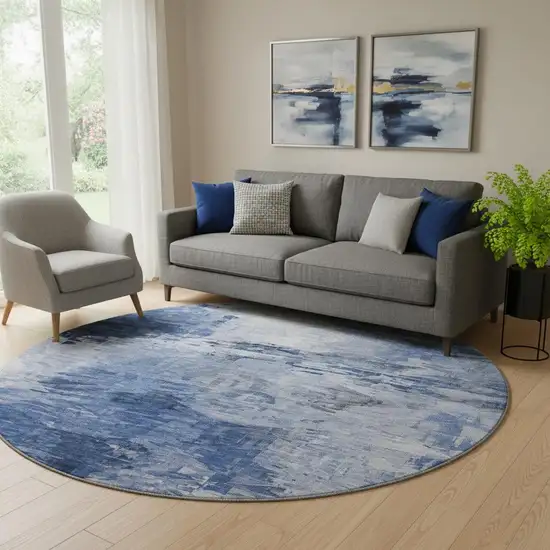 8' Blue And Ivory Abstract Washable Round Rug With UV Protection Photo 1