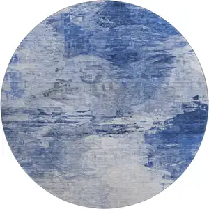 Photo of 8' Blue And Ivory Abstract Washable Round Rug With UV Protection