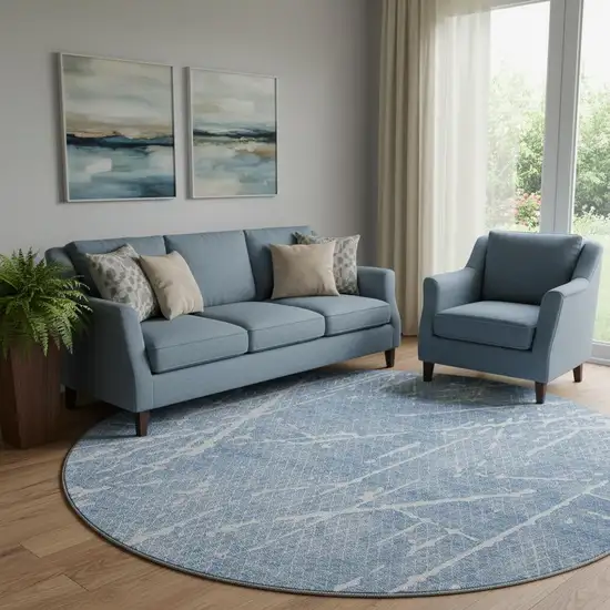 8' Blue And Ivory Abstract Washable Round Rug With UV Protection Photo 1