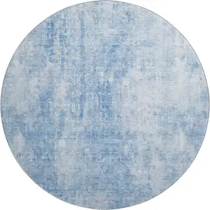 Photo of 8' Blue And Ivory Abstract Washable Round Rug With UV Protection