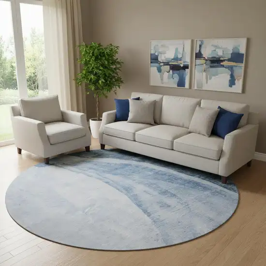 8' Blue And Ivory Abstract Washable Round Rug With UV Protection Photo 1