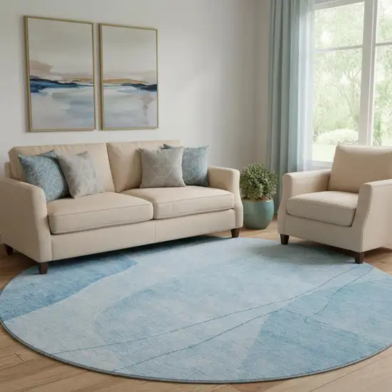 8' Blue And Ivory Abstract Washable Round Rug With UV Protection Photo 1