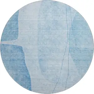 Photo of 8' Blue And Ivory Abstract Washable Round Rug With UV Protection