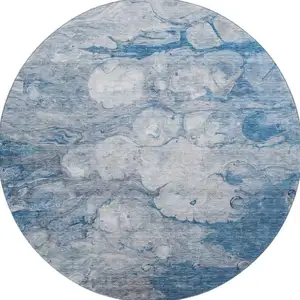 Photo of 8' Blue And Ivory Abstract Washable Round Rug With UV Protection