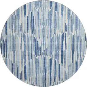 Photo of 8' Blue And Ivory Abstract Washable Round Rug With UV Protection