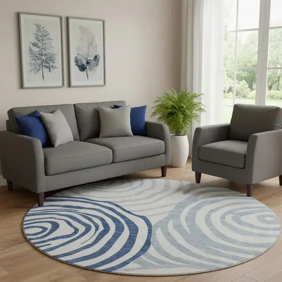 8' Blue And Ivory Abstract Washable Round Rug With UV Protection Photo 1