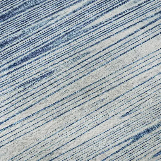 8' Blue And Ivory Abstract Washable Round Rug With UV Protection Photo 9