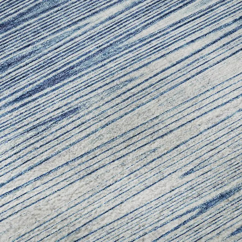 8' Blue And Ivory Abstract Washable Round Rug With UV Protection Photo 9