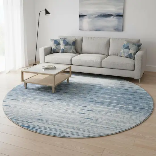 8' Blue And Ivory Abstract Washable Round Rug With UV Protection Photo 2
