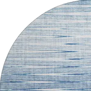 Photo of 8' Blue And Ivory Abstract Washable Round Rug With UV Protection