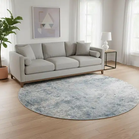 8' Blue And Ivory Abstract Washable Round Rug With UV Protection Photo 2