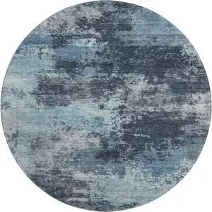 Photo of 8' Blue And Ivory Abstract Washable Round Rug With UV Protection