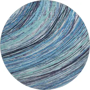 Photo of 8' Blue And Ivory Abstract Washable Round Rug With UV Protection