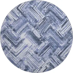 Photo of 8' Blue And Ivory Chevron Washable Round Rug With UV Protection