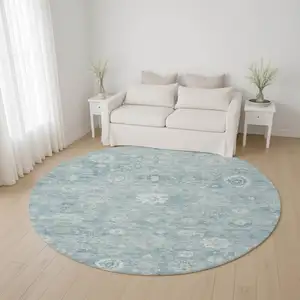 Photo of 8' Blue And Ivory Damask Washable Round Rug With UV Protection