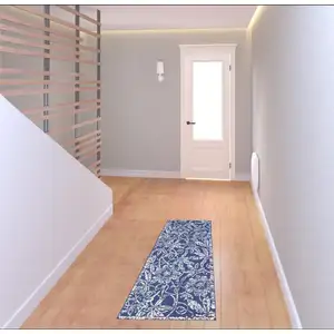 Photo of 6' Blue And Ivory Floral Distressed Runner Rug