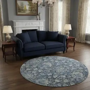 Photo of 8' Blue And Ivory Floral Medallion Washable Round Rug With UV Protection
