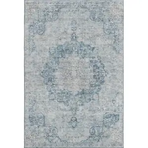Photo of 8' Blue And Ivory Floral Washable Area Rug With UV Protection