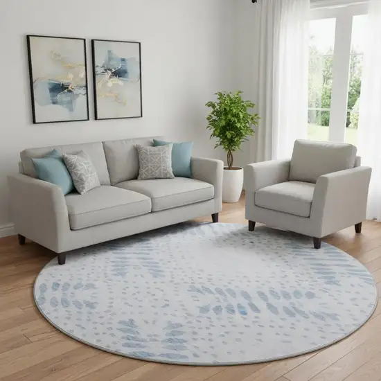 8' Blue And Ivory Floral Washable Round Rug With UV Protection Photo 1