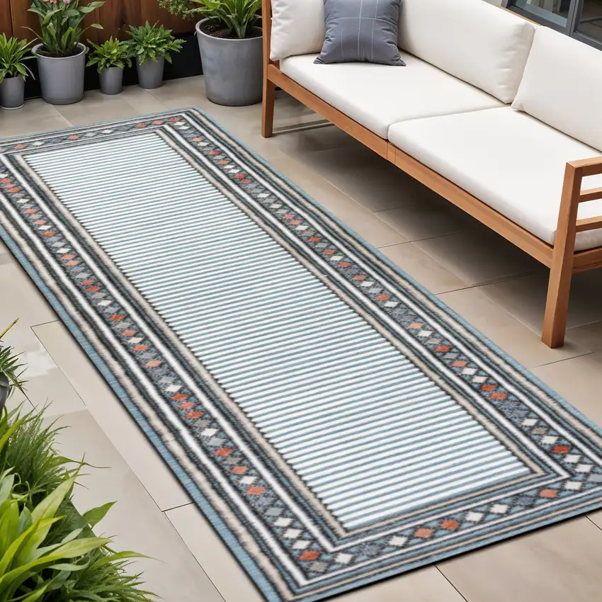8' Blue And Ivory Geometric Indoor Outdoor Runner Rug Photo 1