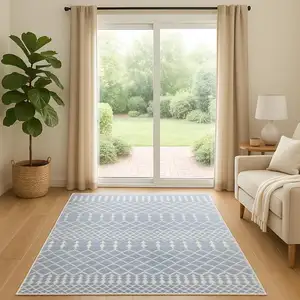 Photo of 6' Blue And Ivory Geometric Runner Rug