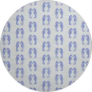 Photo of 8' Blue And Ivory Geometric Washable Round Rug With UV Protection