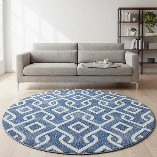 8' Blue And Ivory Geometric Washable Round Rug With UV Protection Photo 2
