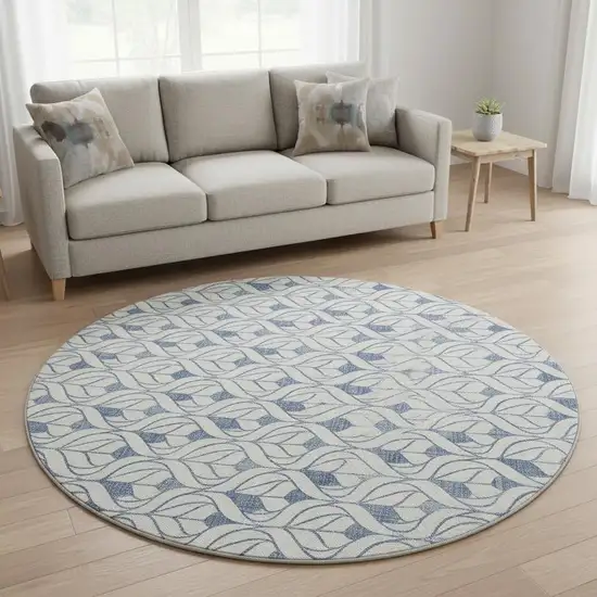 8' Blue And Ivory Geometric Washable Round Rug With UV Protection Photo 2