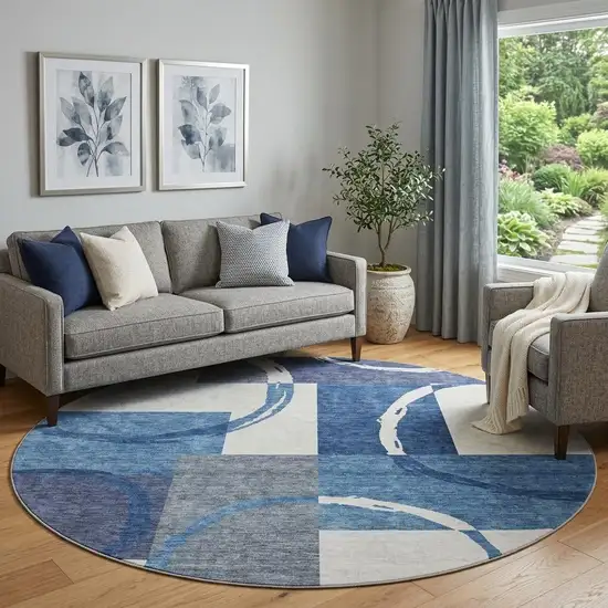 8' Blue And Ivory Geometric Washable Round Rug With UV Protection Photo 1