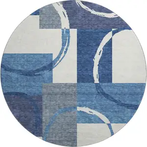 Photo of 8' Blue And Ivory Geometric Washable Round Rug With UV Protection